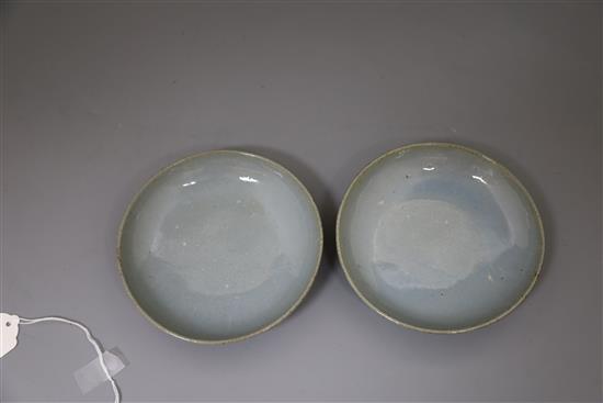 A pair Chinese Jun type saucer dishes and a similar bud-shaped water pot, 18th/19th century, dishes 16cm diameter, pot H. 5.3cm